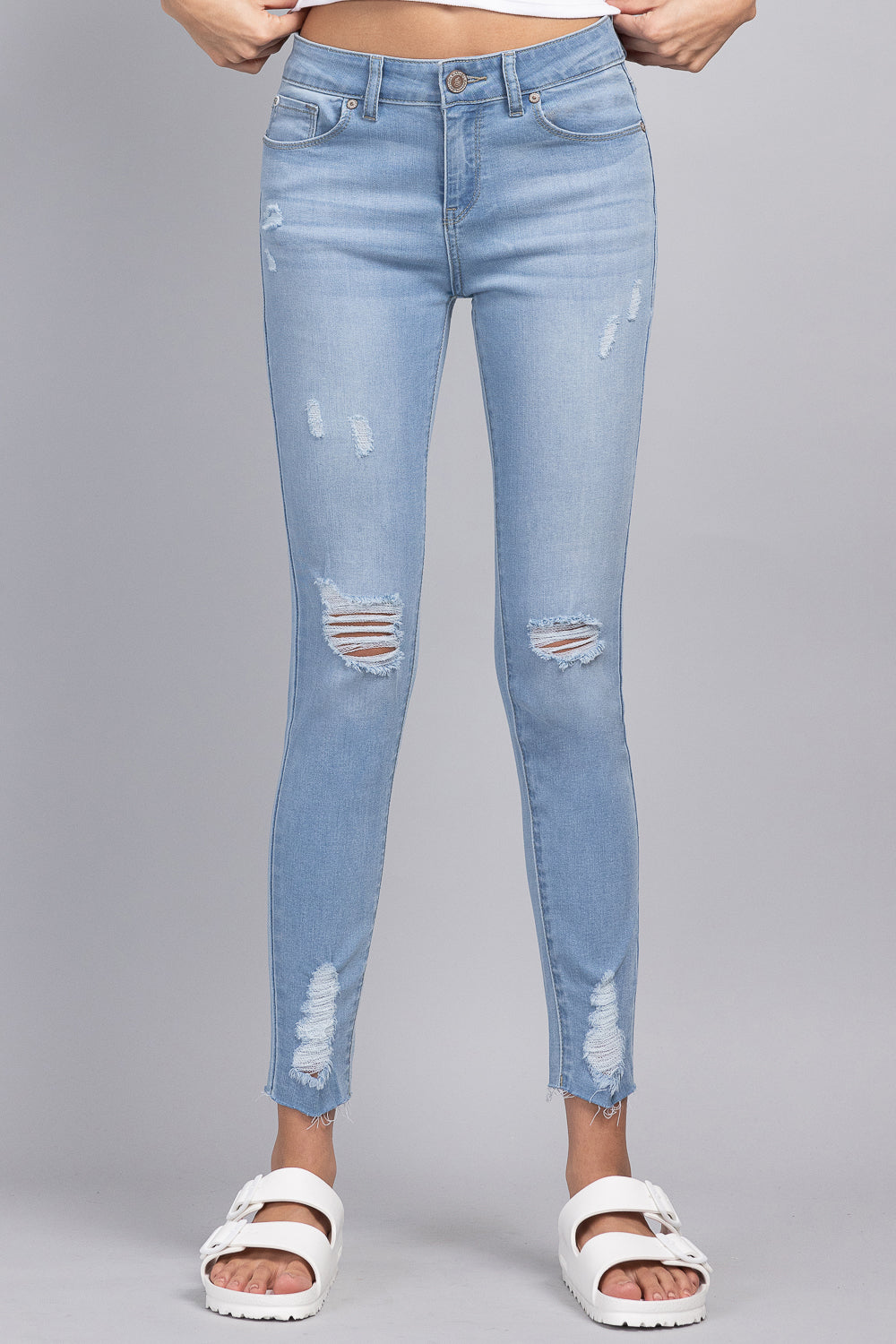 Distressed Mid Rise Skinny Jeans