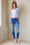 Jeans ajustados push up destruidos de tiro medio