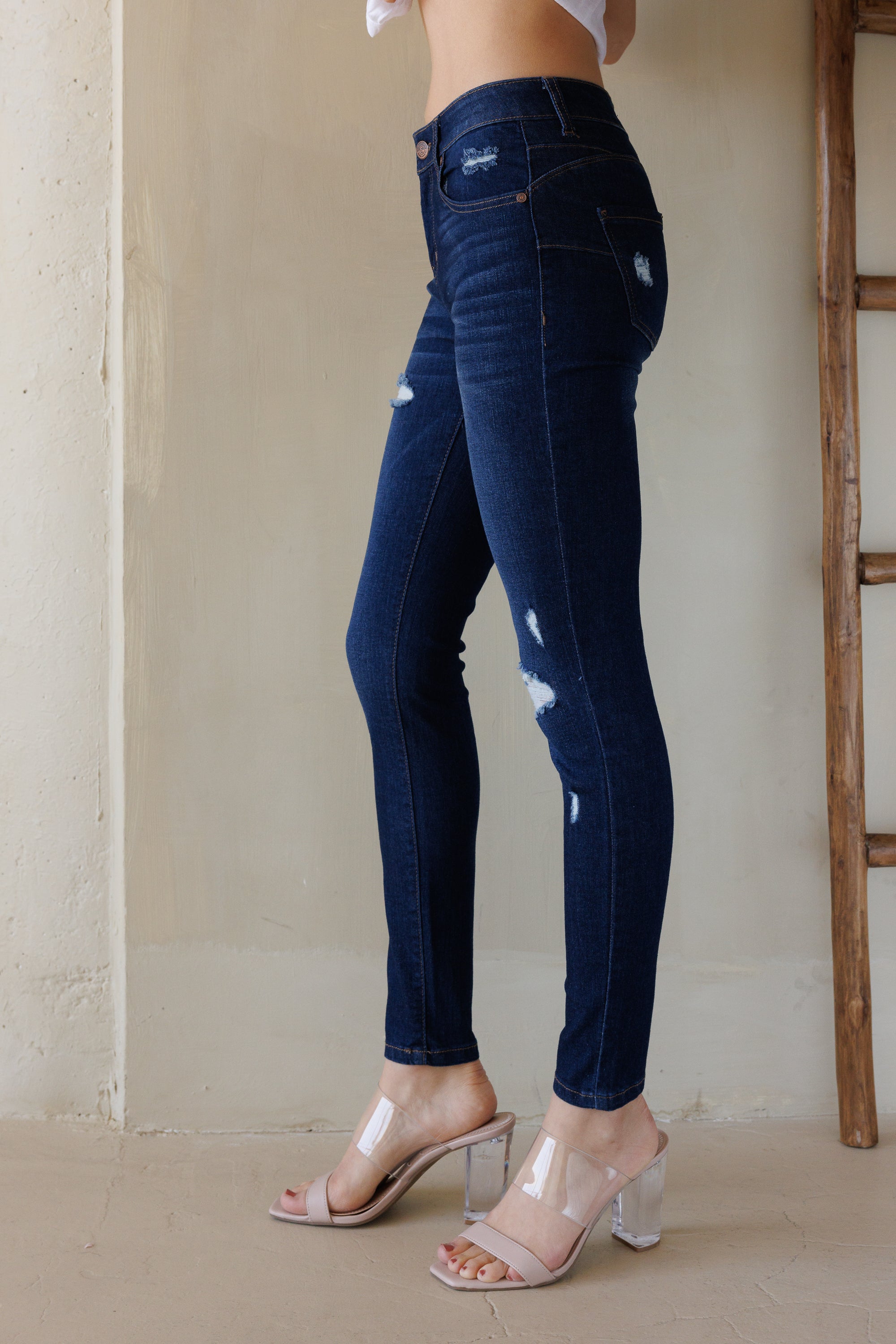 Mid Rise Destructed Push Up Skinny Jeans
