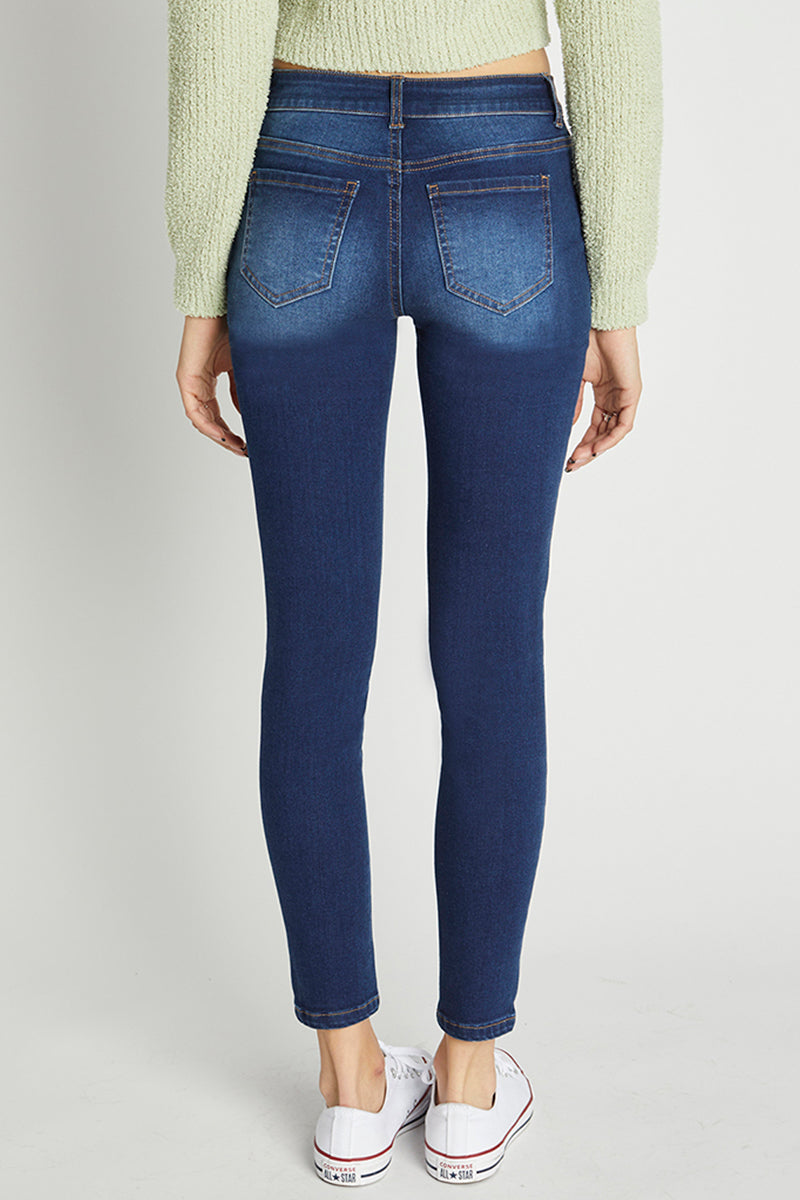 Jeans ajustados al tobillo de tiro medio