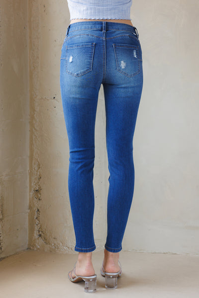 Mid Rise Destructed Push Up Skinny Jeans