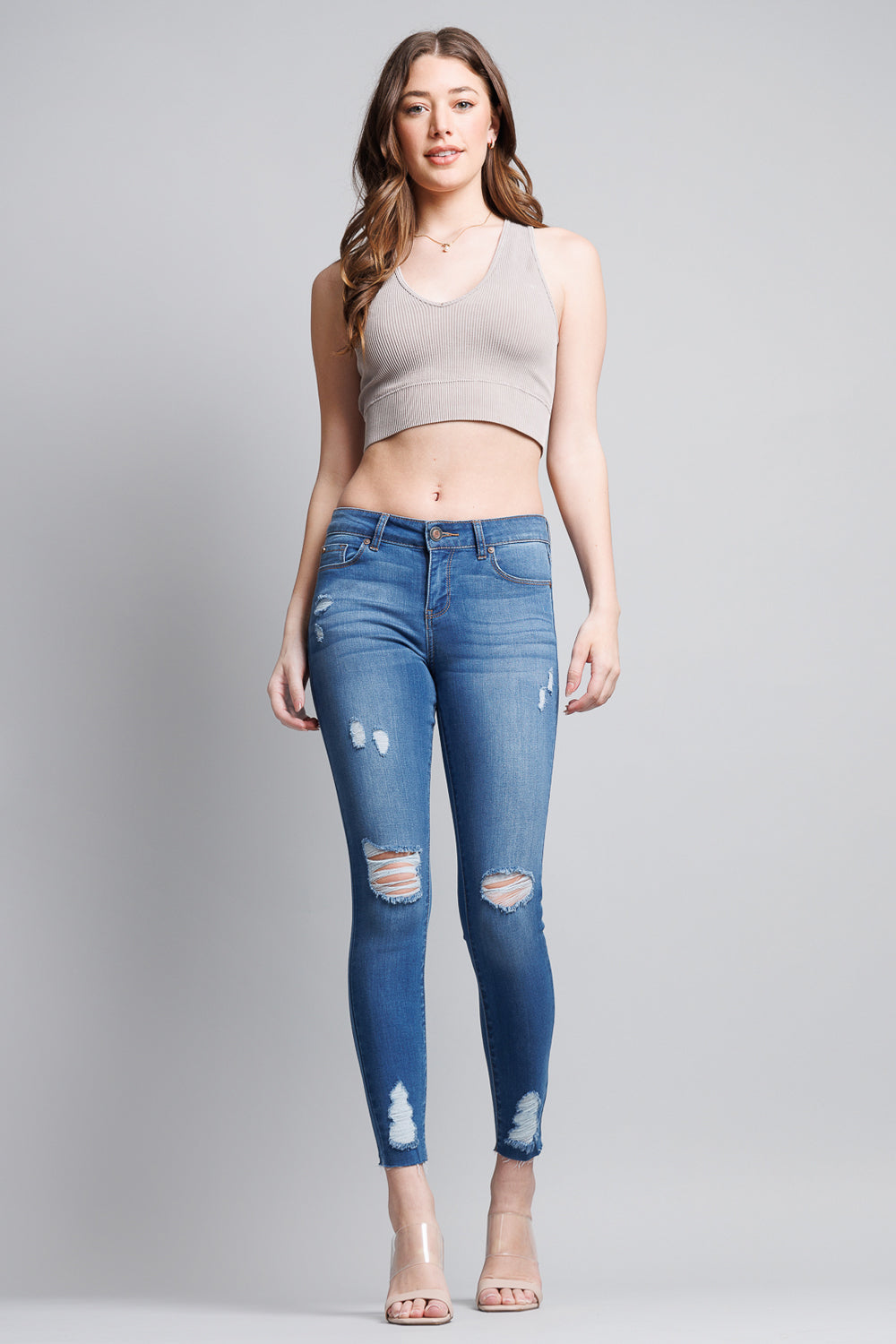 Distressed Mid Rise Skinny Jeans with Chewed Hems