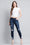 Distressed Mid Rise Skinny Jeans with Chewed Hems