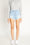 High Rise 5 Exposed Button Down Destructed Shorts