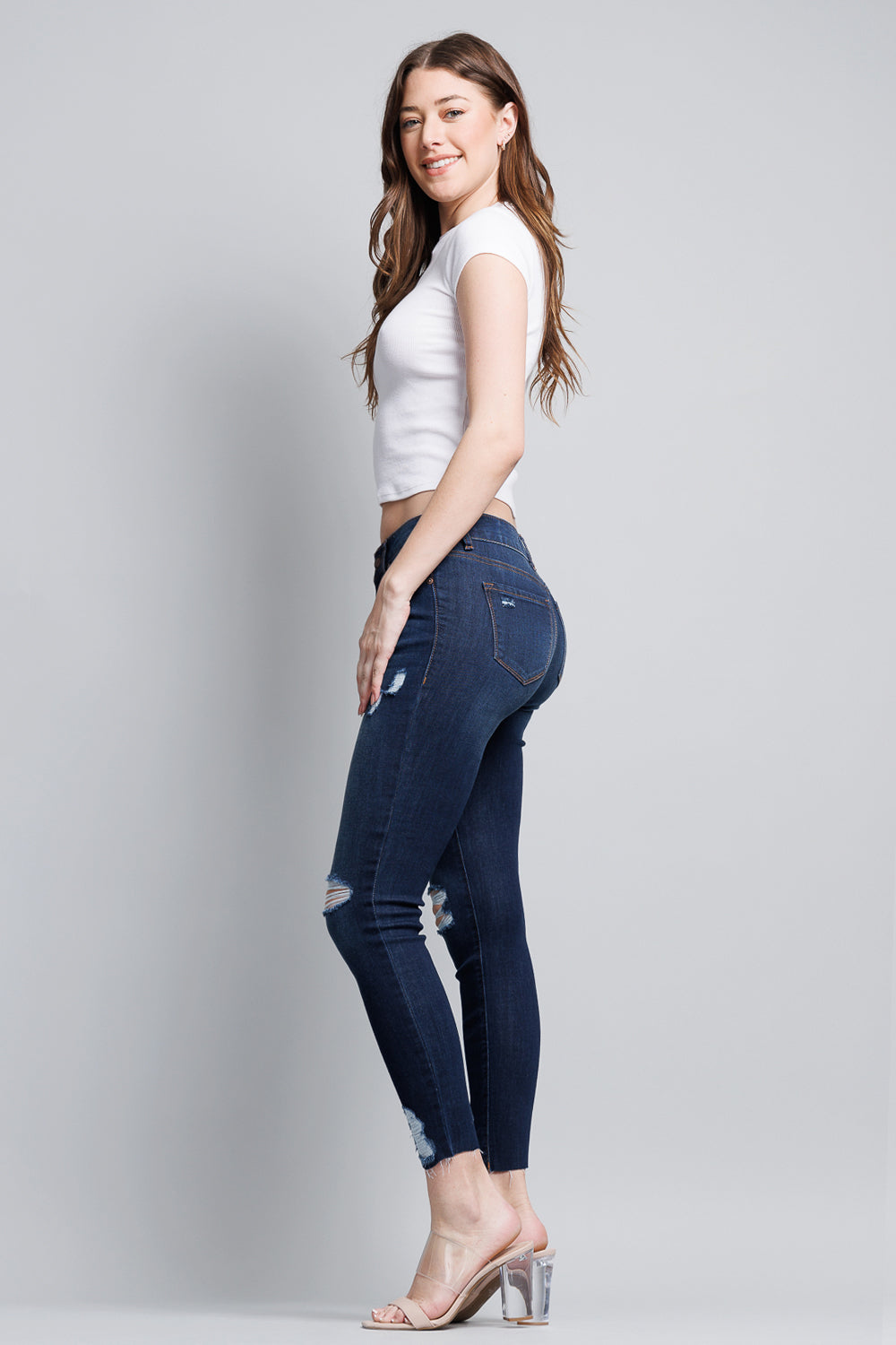 Distressed Mid Rise Skinny Jeans with Chewed Hems