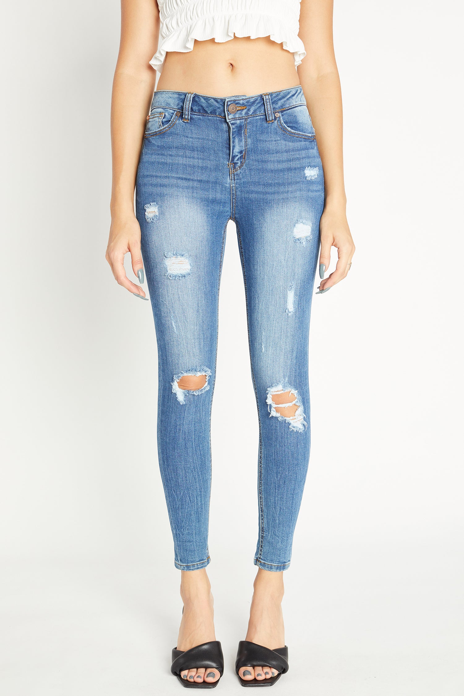 Distressed Mid Rise Ankle Skinny Jeans